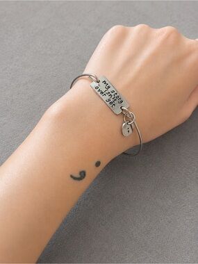 Hand Stamped “My Story Isn’t Over Yet” Inspirational Silver Tone Bangle